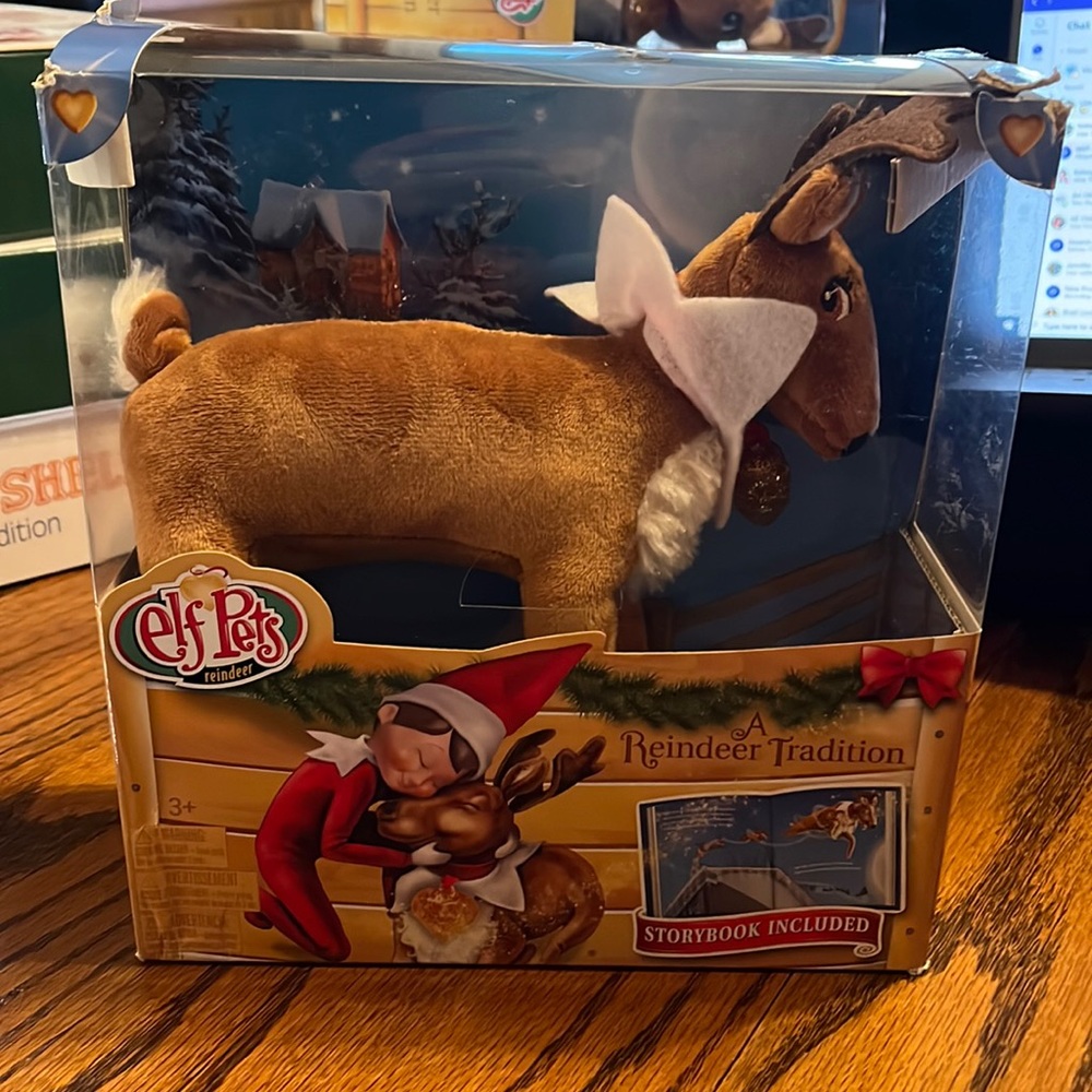 Elf pets reindeer